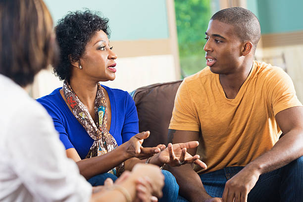 Woman discussing something during support meeting or Bible study