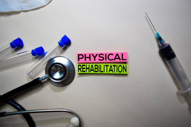 Physical Rehabilitation text on Sticky Notes. Top view isolated on office desk. Healthcare/Medical concept